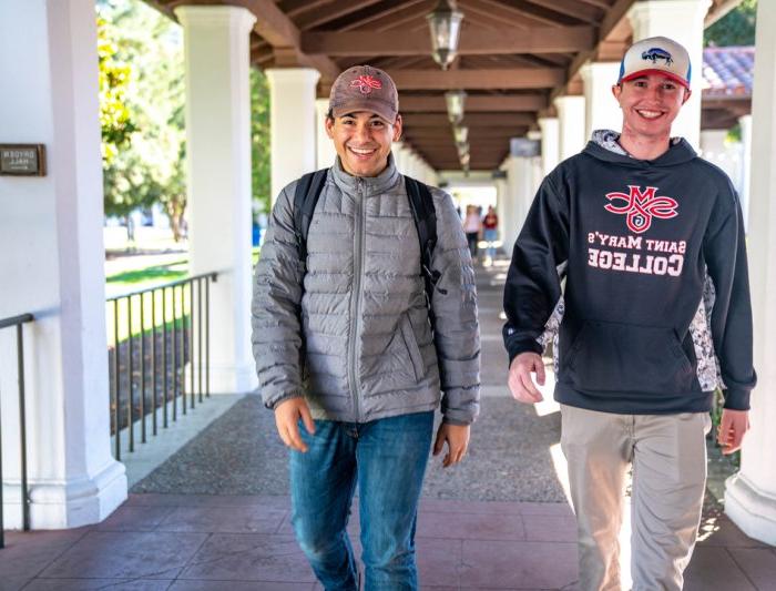 Saint Mary's students walking together smiling